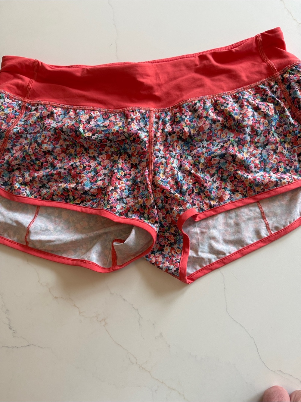 Lululemon shorts with flower Coral Trim size 10 with liner
